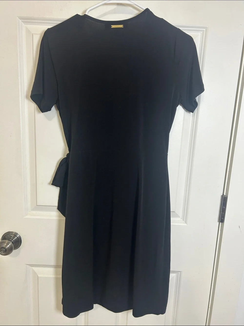 Michael Kors women’s short sleeve wrapped dress size small black with gold ring